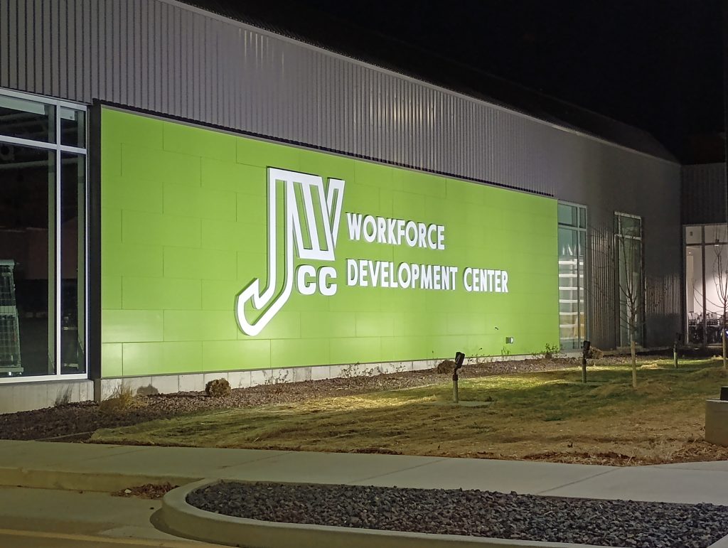 new WDC expansion sign at night