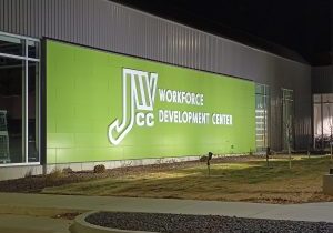 new WDC expansion sign at night